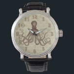 bruine inktvis met ankers horloge<br><div class="desc">Deze prachtige antiek octopustekening* uit de 19e eeuw is bruin verkleurd en geplaatst op een lichtbruine - beige, verdrietige / grunge achtergrond met een zwak ankerpatroon. Het resultaat is een origineel horloge dat past bij uw nautische en strand thema of steampunk mode. De volgnummers worden uitgevoerd in een fancy, Victoriaans...</div>