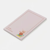 Bruine kleine boomgaard op een Boekleraar notitie Post-it® Notes (Schuin)