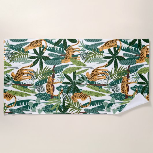 Bruine luipaard in tropische spoelbladeren van oer strandlaken (Voorkant)