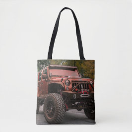 Bruine opgepimpte sport utility vehicle op een tote bag