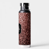 Bruine rode vlekjes waterfles (Links)