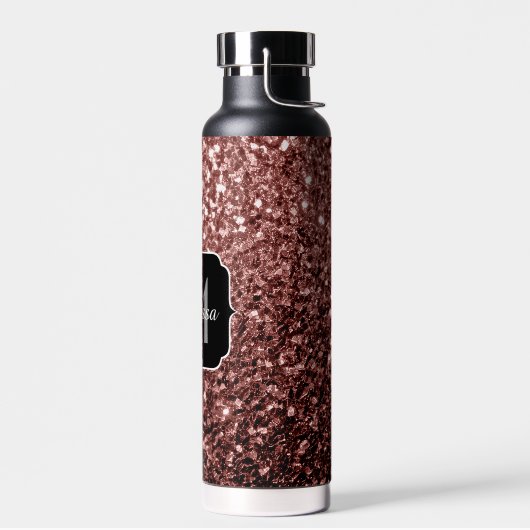 Bruine rode vlekjes waterfles (Links)