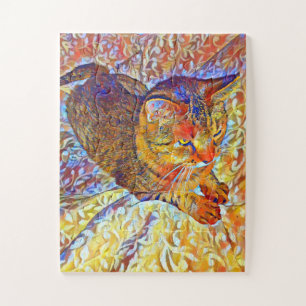 Bruine tabbykat die rust op een comfortabel bed legpuzzel