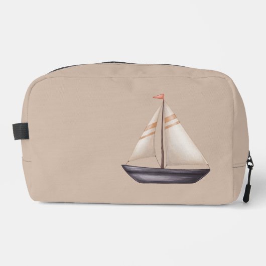Bruine zeilboot en naam op beige toilettasje (Voorkant)