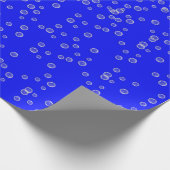 Bubbels op levendig blauw cadeaupapier (Hoek)