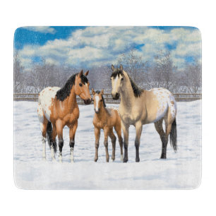 Buckskin Appaloosa paarden bij sneeuw Snijplank
