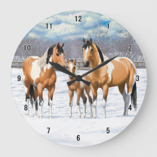 Buckskin Paint Horses in sneeuw Grote Klok