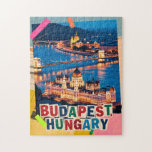 Budapest Hungary Night Cityscape Pop Art Collage Legpuzzel<br><div class="desc">Budapest Hungary night cityscape showcasing the historic Parliament building and Chain Bridge glowing along the Danube River. This illuminated skyline is reimagined as a pop art collage, blending classic vintage retro travel vibes with mixed media textures to celebrate Eastern Europe travel. Often called the 'Pearl of the Danube, ' this...</div>