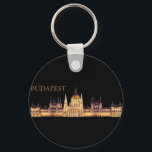 Budapest Travel Souvenir Sleutelhanger<br><div class="desc">Het gebouw van het Hongaarse parlement is waarschijnlijk de meest herkenbare mijlpaal in de hoofdstad Boedapest. Deze reissouvenir kenmerkt deze opmerkelijke architectuur die 's nachts verlicht werd. Het perfecte cadeau voor jou of iemand anders om een reis naar deze ongelooflijke stad te markeren. Deze sleutelhanger is volledig aanpasbaar en geweldig!...</div>