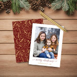 BUDGET Red Gold Script Merry kerstfoto<br><div class="desc">BEGROTING Rood Goud Eenvoudig Manuscript Modern Merry kerstfoto Holiday Kaart die uw favoriete foto's en een eenvoudig, maar elegant manuscript Merry kerstgroet bevat. De rug is voorzien van een festief, maar elegant patroon van gouden folie-achtige bladeren, dennenbomen en andere winterbotanische groen tegen een winterrode achtergrond. Ideaal voor je vakantiekaarten dit...</div>