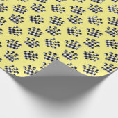 Bufferspelden op geel cadeaupapier (Hoek)