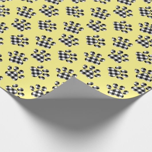 Bufferspelden op geel cadeaupapier (Hoek)