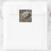 Buiten café langs River Walk en brug over Vierkante Sticker (Tas)