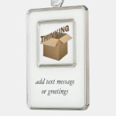 Buiten de doos denken verzilverd omlijst ornament (Links)