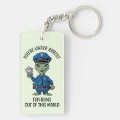 buitenaardse politieagent sleutelhanger (achterkant)