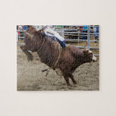 Bull-rijder op rodeo legpuzzel (Horizontaal)