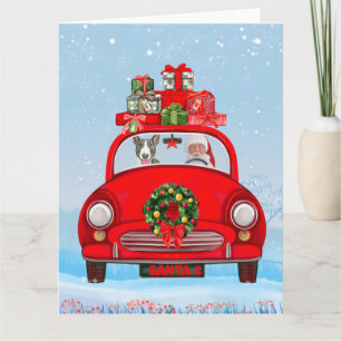 Bull Terrier hond in auto met kerstman Kaart