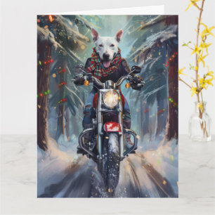 Bull Terrier-hond rijdt op motorfiets met Kerstmis Kaart