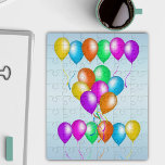 Bunch van Bright Feestelijke Ballonnen Streamers B Puzzel<br><div class="desc">Deze acrylzaagpuzzel heeft een aantal heldere feestelijke ballonnen verspreid over. Ze zijn in een veelheid aan kleuren en hebben hangende bijpassende streamers op een lichtblauwe achtergrond.</div>