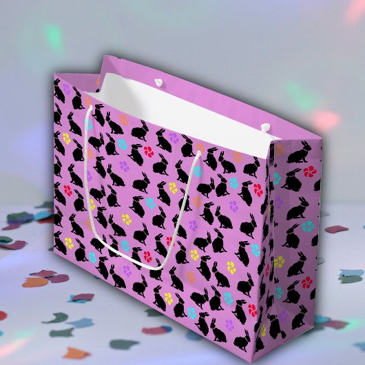 Bunch van zwart silhouet konijnen bloemen roze groot cadeauzakje