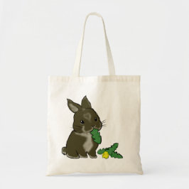 Bunny eating dandelion tote bag