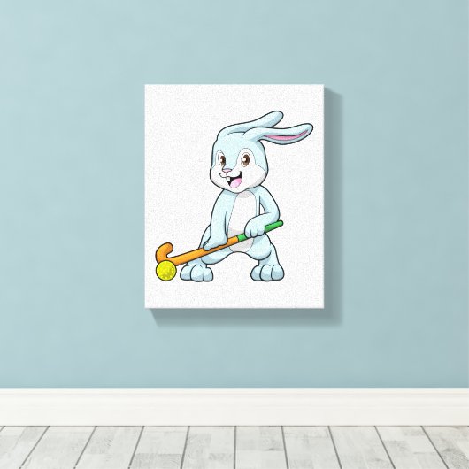 Bunny op Field hockey met Hockey stick Canvas Afdruk (Insitu (Houten vloer))