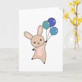 Bunny vliegt ballonnen boven stutdieren voor kinde kaart (Gele Bloem)