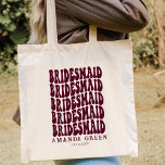 Burgundy Fun Retro Boho Personalized Bachelorette Tote Bag<br><div class="desc">Op zoek naar de perfecte gepersonaliseerde bridesmaïde canvas tassen voor je aanstaande vrijgezellenfeest? Kijk niet verder dan deze gepersonaliseerde bachelorette canvas tas. Deze canvas tas is perfect om al je spullen mee te nemen op je grote dag. Bovendien is het het perfecte geschenk voor je bruidsmeisjes - wie zou niet...</div>