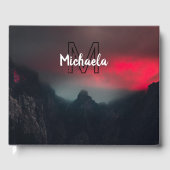 Burning clouds, fog and mountains monogram in sky gastenboek (Voorkant)