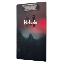 Burning clouds, fog and mountains monogram in sky klembord