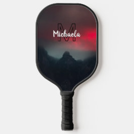 Burning clouds, fog and mountains monogram in sky pickleball paddle