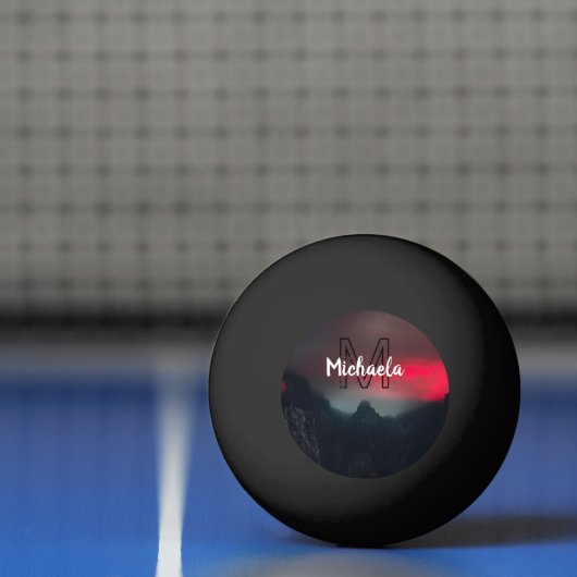 Burning clouds, fog and mountains monogram in sky pingpongbal (Net)