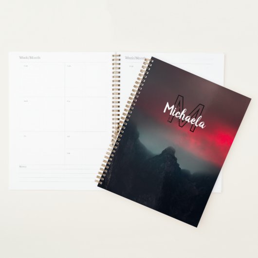 Burning clouds, fog and mountains monogram in sky planner (Display)