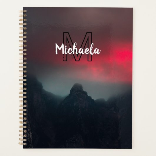 Burning clouds, fog and mountains monogram in sky planner (Voorkant)