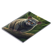 Bush Baby Perched on Jungle Branch Notitieboek (Linkerzijde)