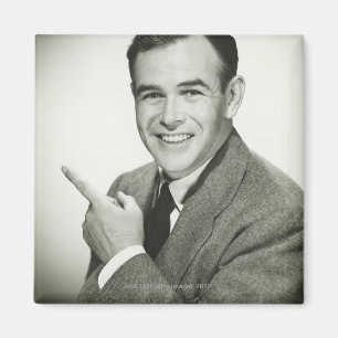 Businessman Pointing Magneet