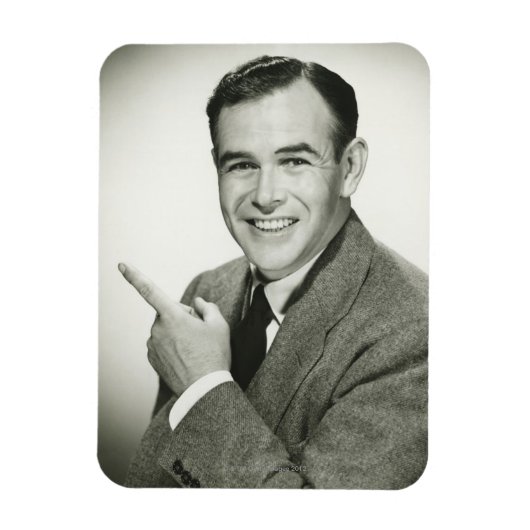 Businessman Pointing Magneet (Verticaal)