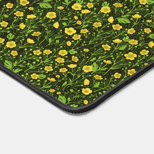 Buttercups op zwart bureaumat (Hoek)