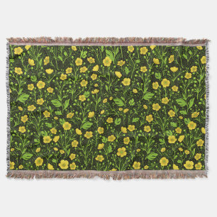 Buttercups op zwart deken