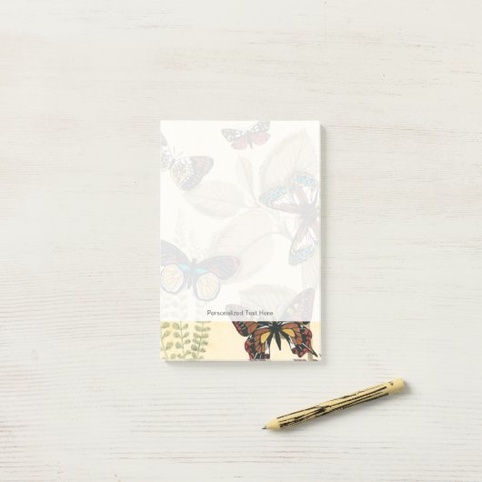 Butterflies glijdend over bladeren post-it® notes (Op bureau)