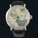 Butterflies op vel Music met Floral Design Horloge<br><div class="desc">Een groen bloemontwerp en bladmuziek dienen als achtergrond voor een trio vlinders in dit stuk van Vision Studio. Het Franse woord voor vlinder, papillon, wordt ook aan de onderkant van het stuk omarmd. Als je een sterke liefde hebt voor vlinders, natuur, of net zoals je jezelf omringt met schoonheid, is...</div>