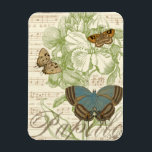 Butterflies op vel Music met Floral Design Magneet<br><div class="desc">Een groen bloemontwerp en bladmuziek dienen als achtergrond voor een trio vlinders in dit stuk van Vision Studio. Het Franse woord voor vlinder, papillon, wordt ook aan de onderkant van het stuk omarmd. Als je een sterke liefde hebt voor vlinders, natuur, of net zoals je jezelf omringt met schoonheid, is...</div>