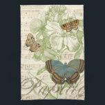 Butterflies op vel Music met Floral Design Theedoek<br><div class="desc">Een groen bloemontwerp en bladmuziek dienen als achtergrond voor een trio vlinders in dit stuk van Vision Studio. Het Franse woord voor vlinder, papillon, wordt ook aan de onderkant van het stuk omarmd. Als je een sterke liefde hebt voor vlinders, natuur, of net zoals je jezelf omringt met schoonheid, is...</div>