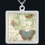 Butterflies op vel Music met Floral Design Zilver Vergulden Ketting<br><div class="desc">Een groen bloemontwerp en bladmuziek dienen als achtergrond voor een trio vlinders in dit stuk van Vision Studio. Het Franse woord voor vlinder, papillon, wordt ook aan de onderkant van het stuk omarmd. Als je een sterke liefde hebt voor vlinders, natuur, of net zoals je jezelf omringt met schoonheid, is...</div>