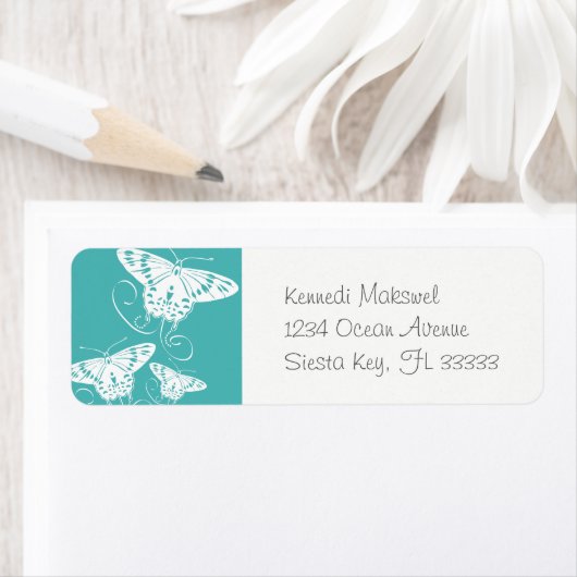 Butterflies White over een Blauwgroen groen patroo Etiket (Insitu)