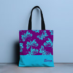Butterfly Flutter Canvas tas<br><div class="desc">Een prachtig paarpatroon met prachtige blauwe vlinders op een levendige paarse achtergrond. Pas met jouw naam aan of schrap naam voor geen naam. Ontworpen voor u door Evco Studio.</div>
