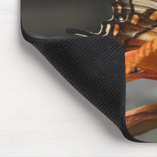 Butterfly in lily mousepad muismat (Hoek)