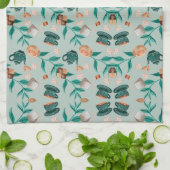 Butterfly motifs on a light background theedoek (Gevouwen)