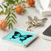 Butterfly - turquoise blauw en zwart sleutelhanger (Zijkant)