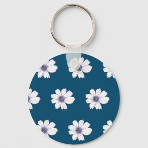 Button met blauw bloempatroon sleutelhanger